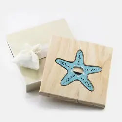 sottopentola in legno con apribottiglie stella marina