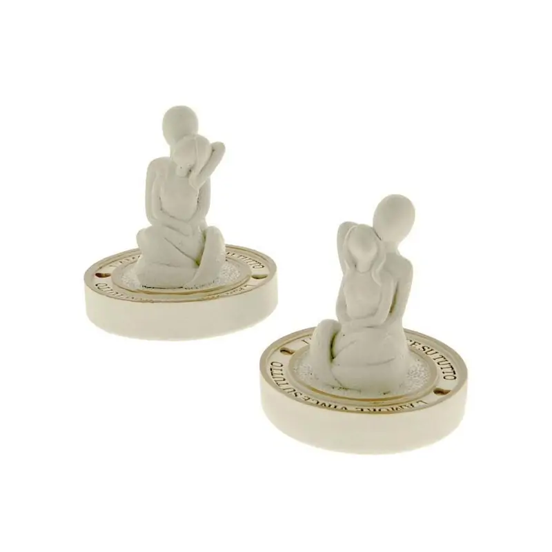 sposi stilizzati in resina bomboniere originali