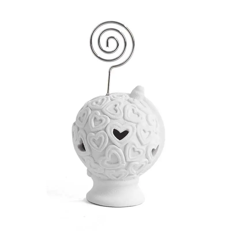 segnaposto tema viaggio clip con mappamondo in porcellana