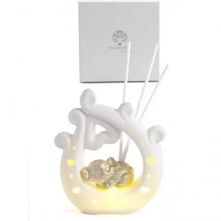 profumatori ambiente cuore ed elefantino in porcellana con luce