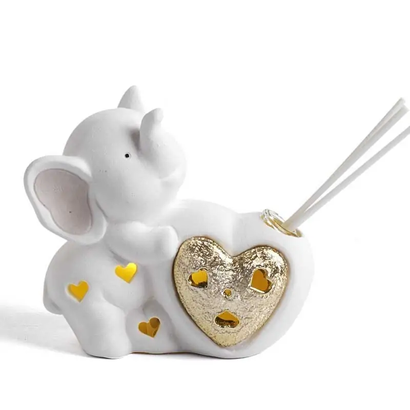 PROFUMATORI AMBIENTE ONLINE BOMBONIERE ELEFANTE CON CUORE ORO E