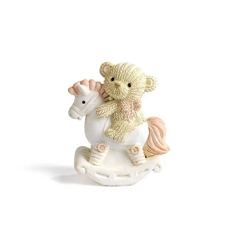 ORSETTA CON CAVALLO DONDOLO ROSA 5.4 CM IN RESINA