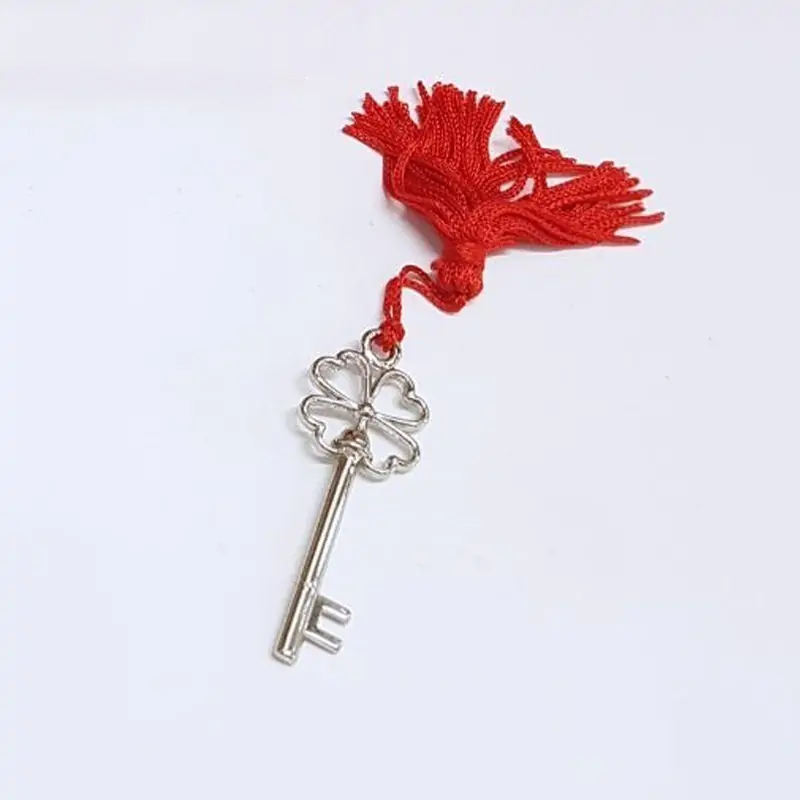 chiave quadrifoglio con nappa